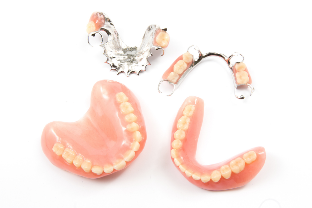 Full and partial dentures available as tooth replacement options at Foxley Lane Dental in Purley