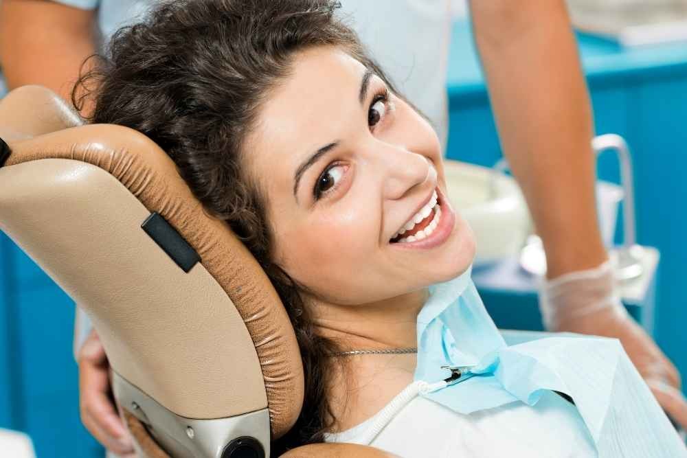 Patient smiling after cosmetic dental treatment