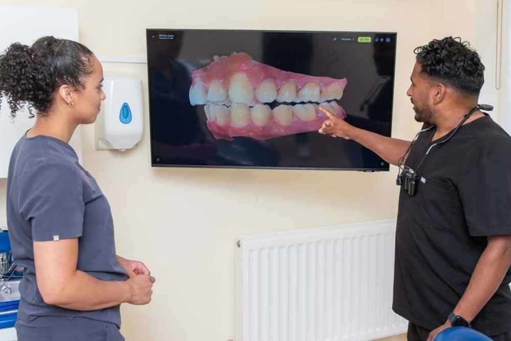 Dental team reviewing a patient’s 3D digital scan at Foxley Lane Dental in Purley