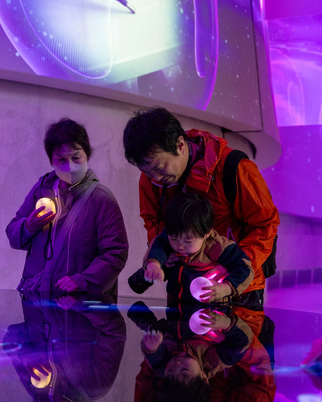 Interior of German Pavilion with immersive storytelling supported by Circular audioguides, built by Futurewave and facts and fiction.
