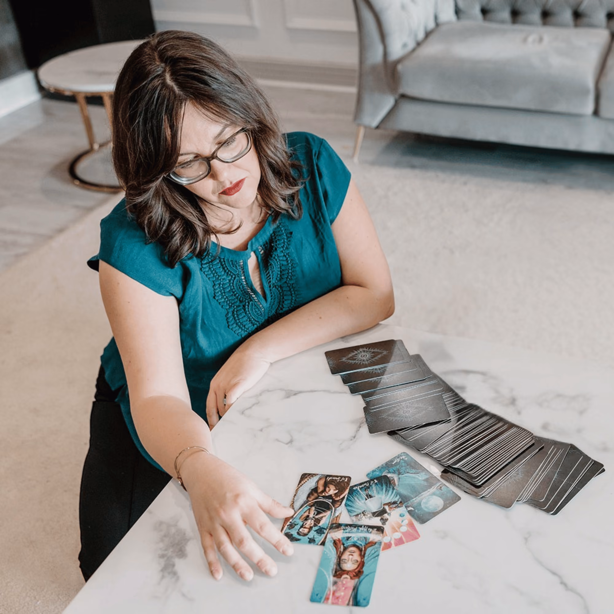 Jessica Paschke drawing tarot cards.