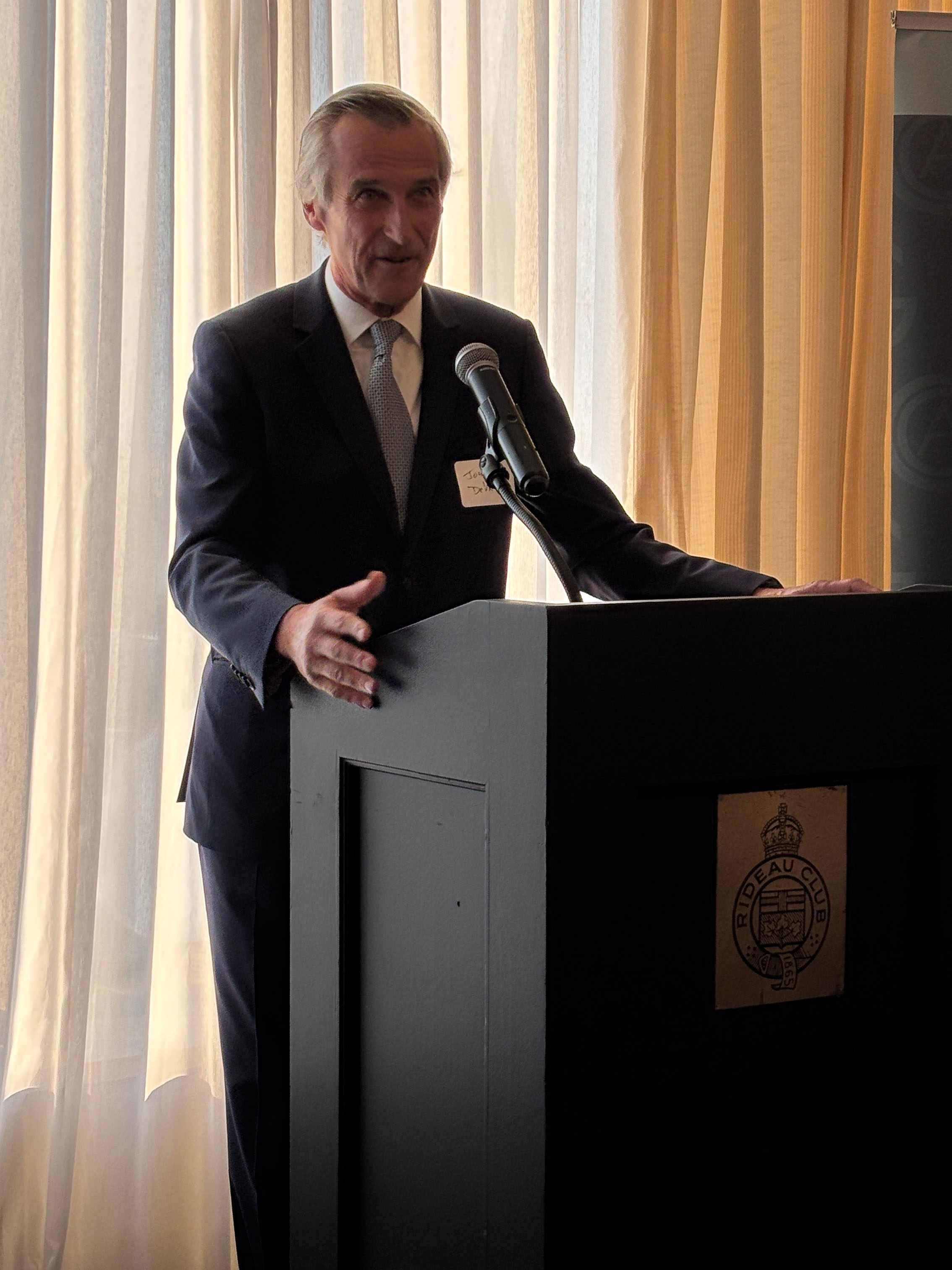 Person speaking at a podium.