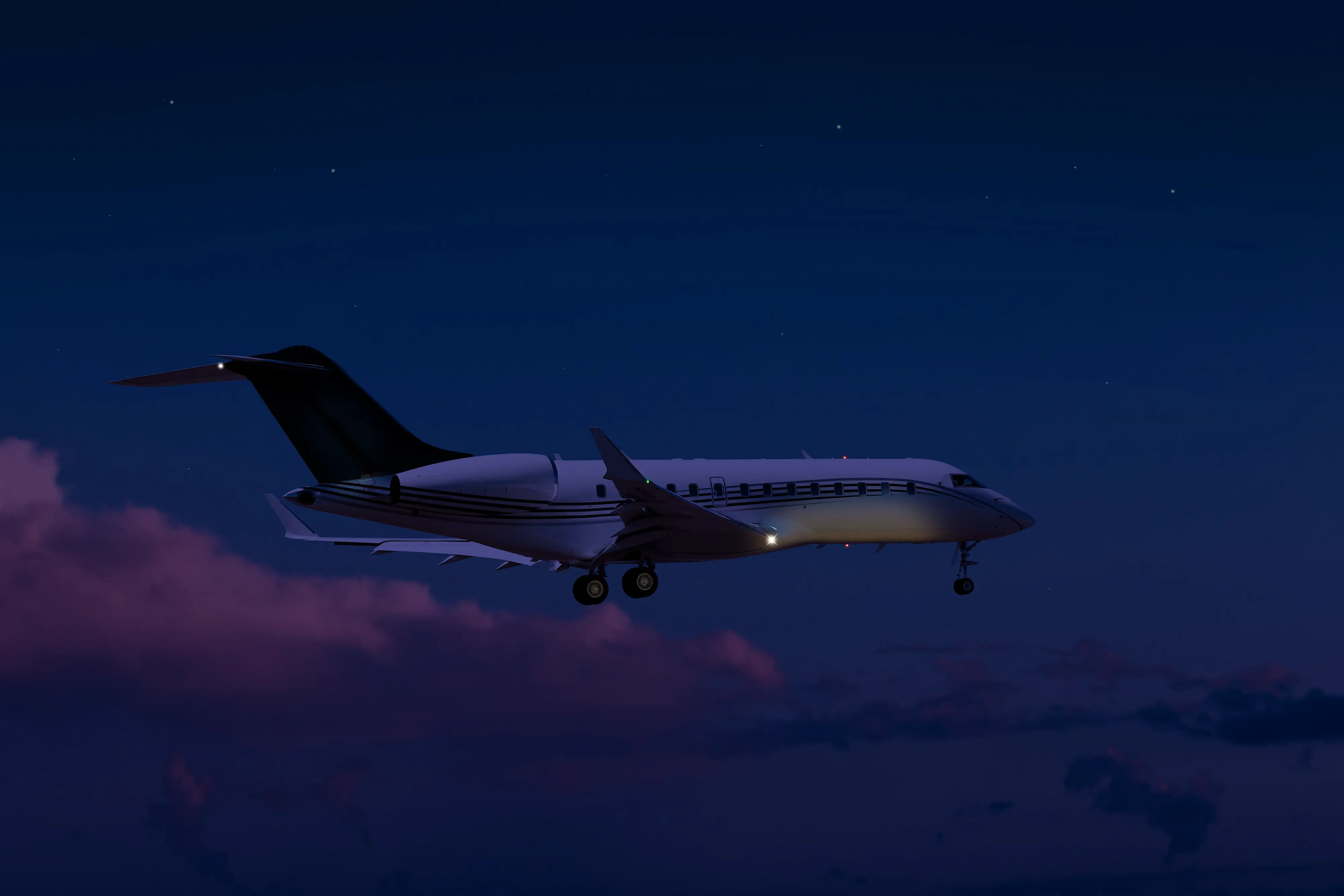 Private jet flying at night above the clouds