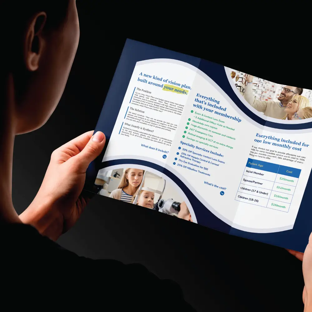 Woman looking at EyeSave brochure