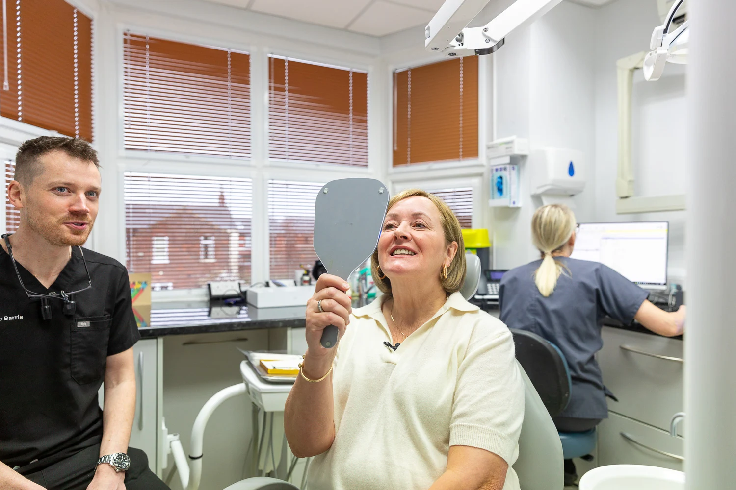 Woman smiling in mirror