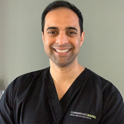 Dr Neil Patel, specialist oral surgeon at Carisbrook Dental