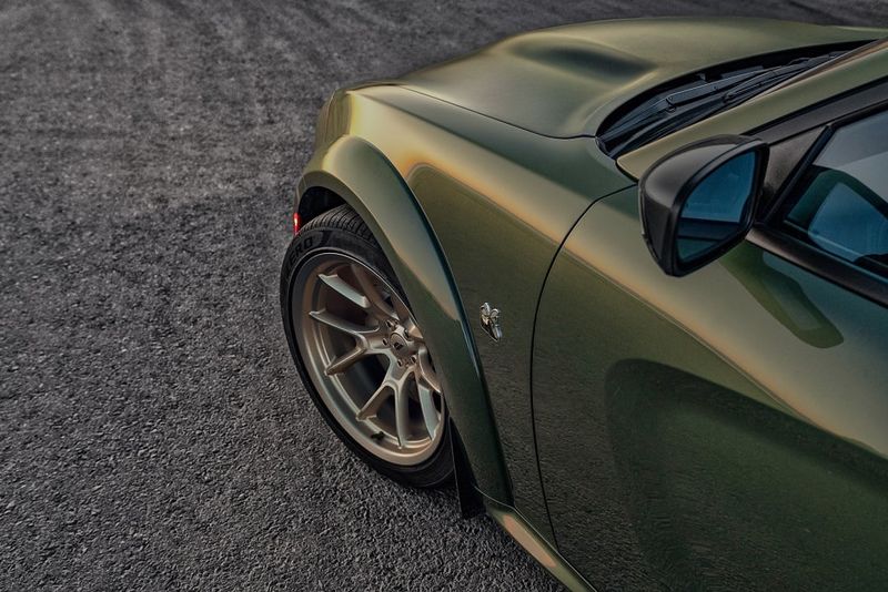 Green performance car wheel detail
