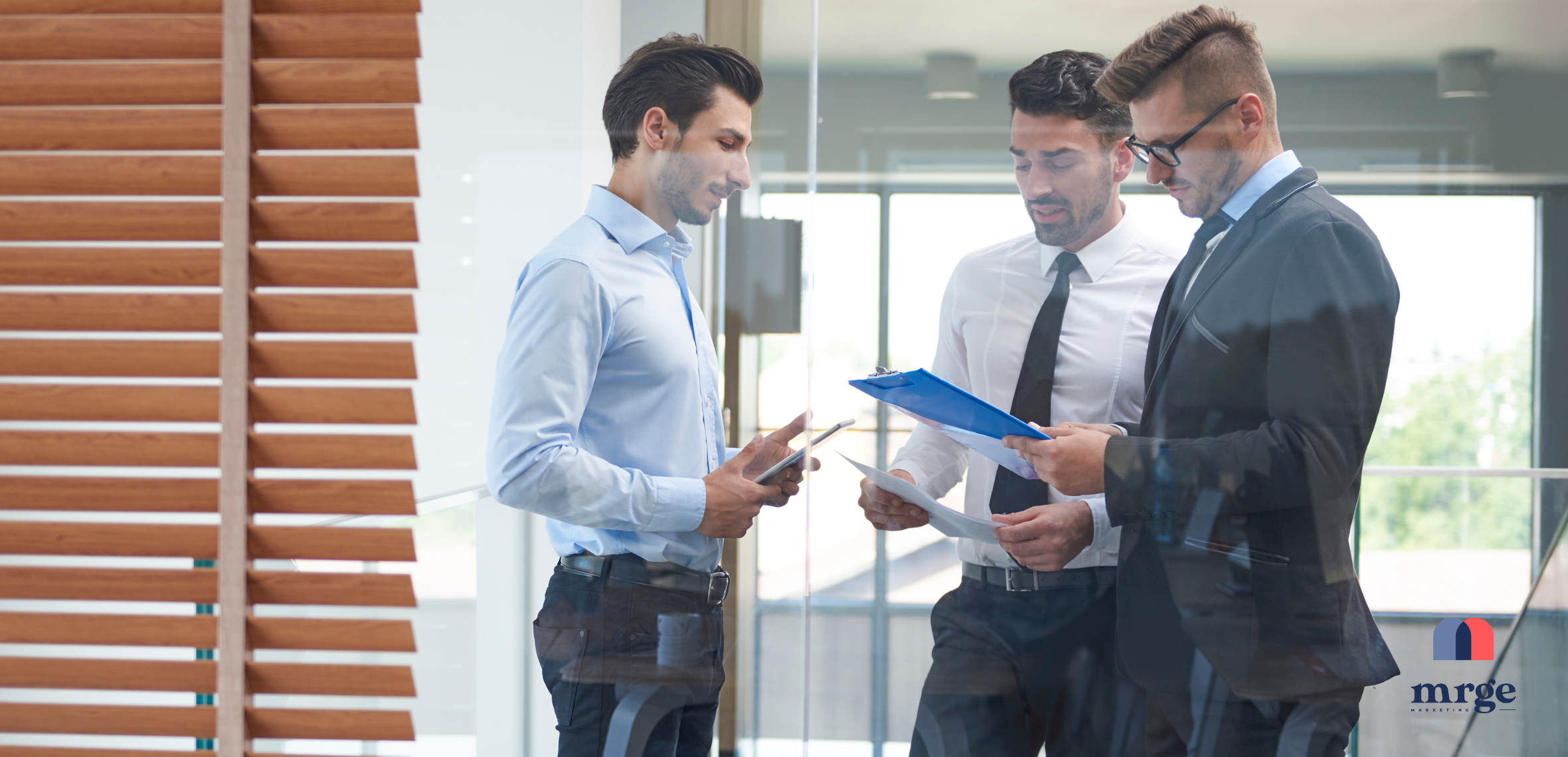 a marketing leader at her desk reviewing reports.