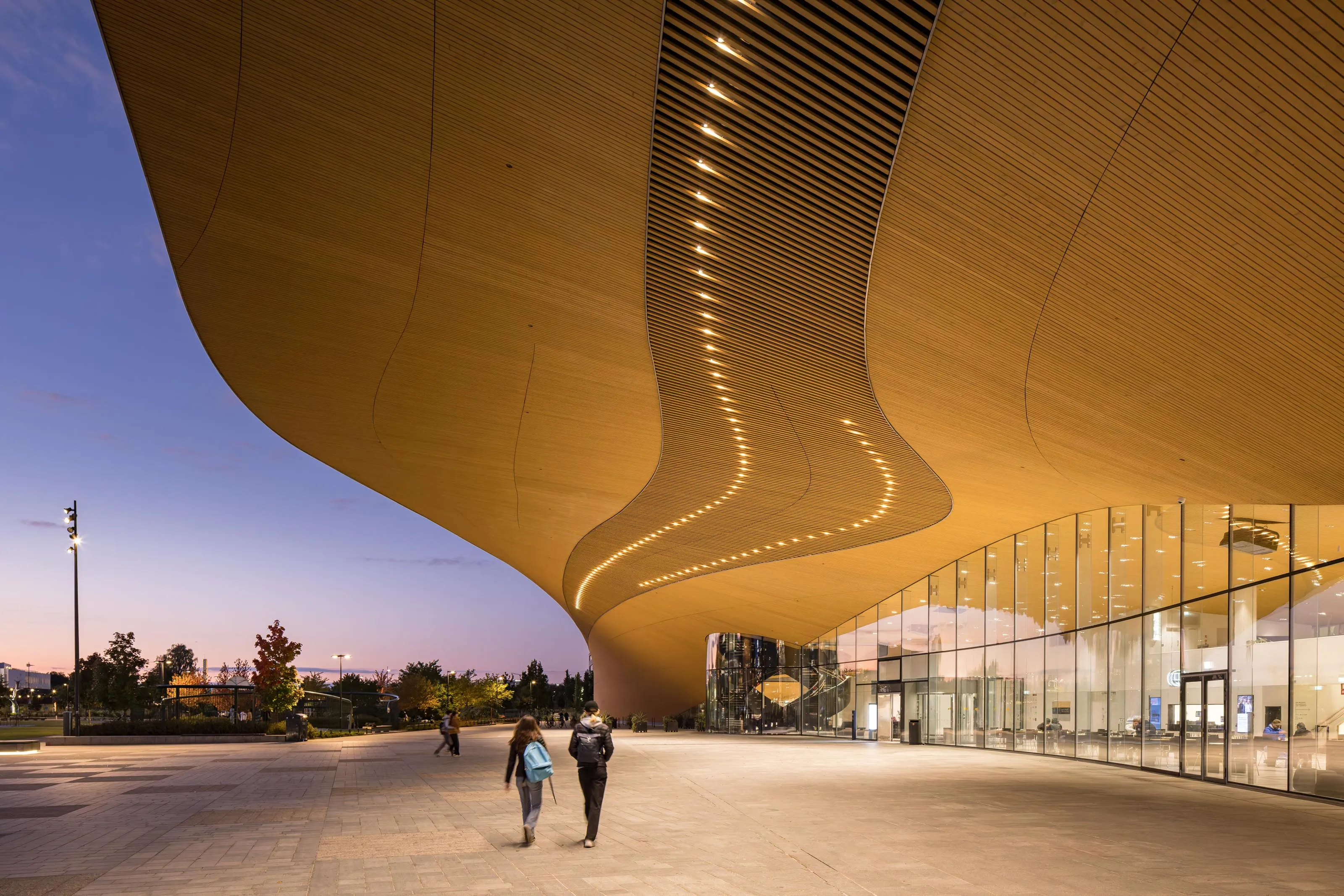 architectural photography of Oodi Central Library in Helsinki, entrance area at night