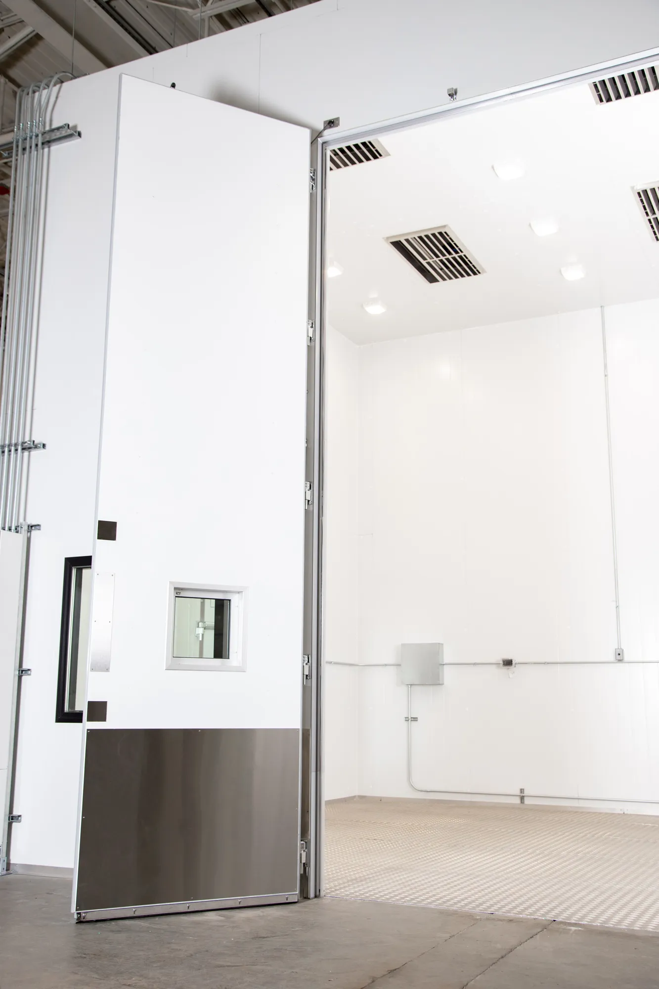 Open doorway to an Engineered Cold Room enclosure.