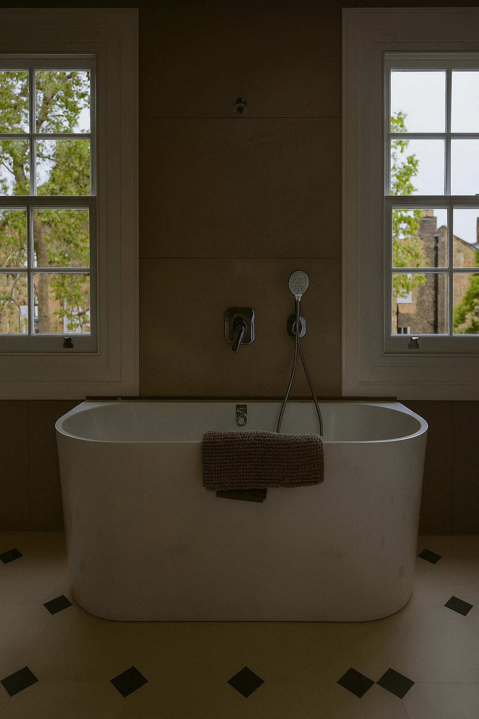 Muted interior shot with concealed services and heritage joinery