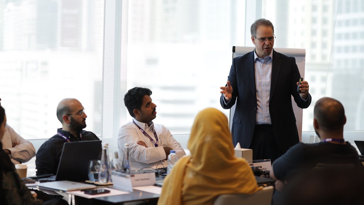 Faculty member leading a Global MBA workshop session