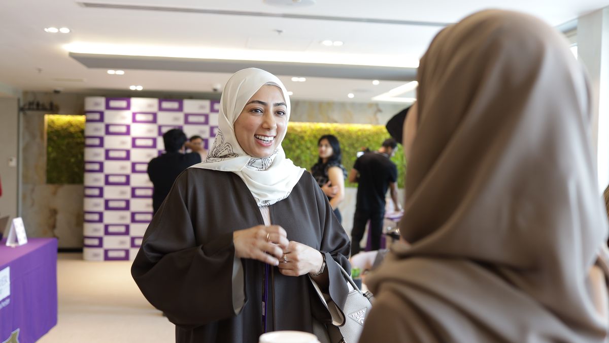 Global MBA participant in conversation at a University of Manchester event