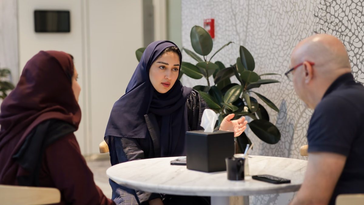 Global MBA participant in conversation with peers at a University of Manchester event