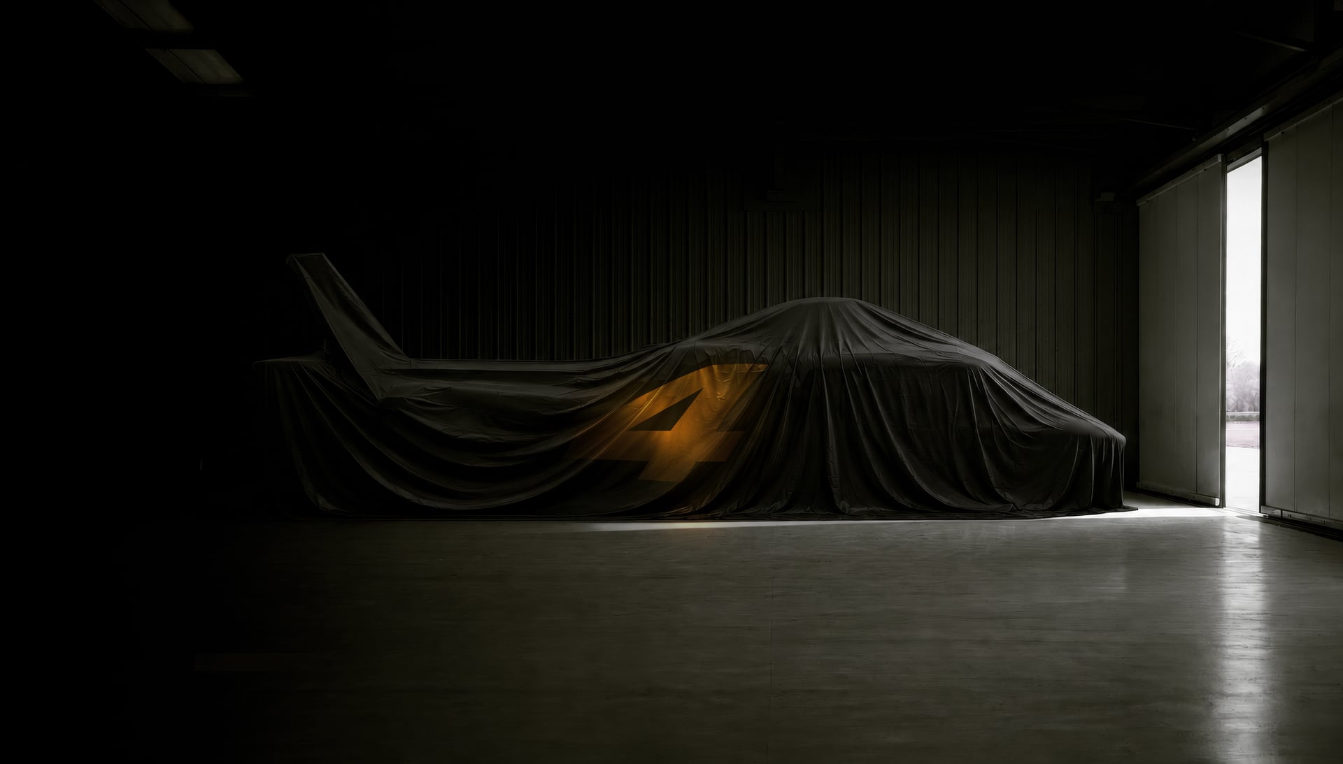 Thunder 4 under covers in a hanger.