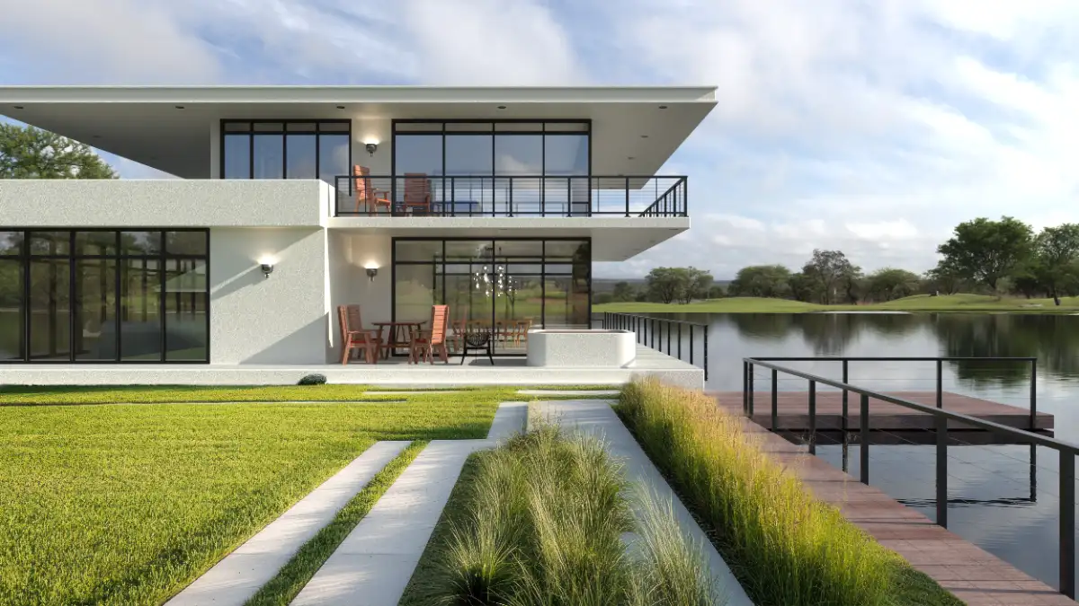 Modern lakehouse exterior with Feeney cable railings on upper balcony, floor-to-ceiling glass, and private dock on calm water