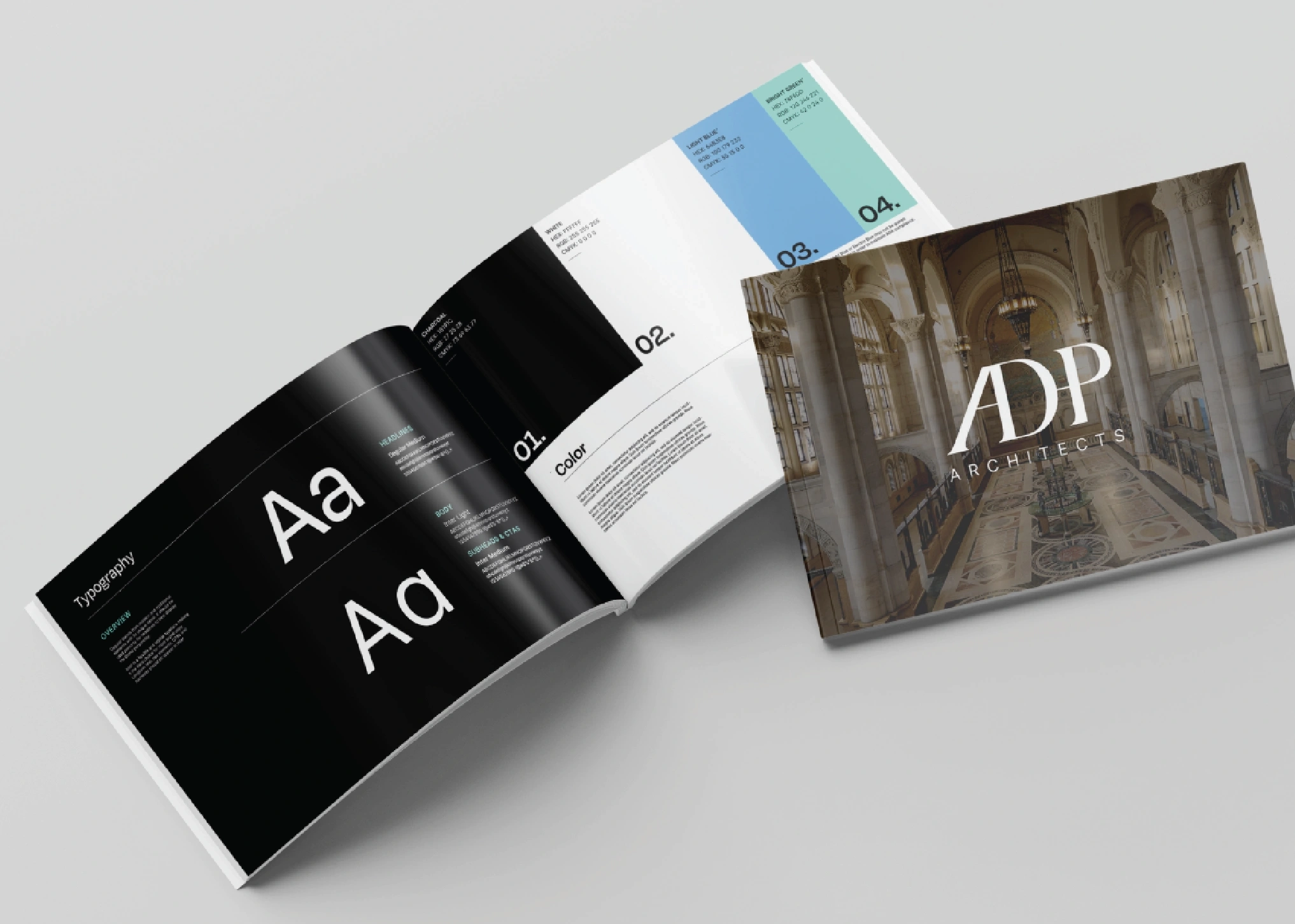 ADP Architects brand book mockup showing typography and color palette pages alongside a cover featuring a grand historic interior