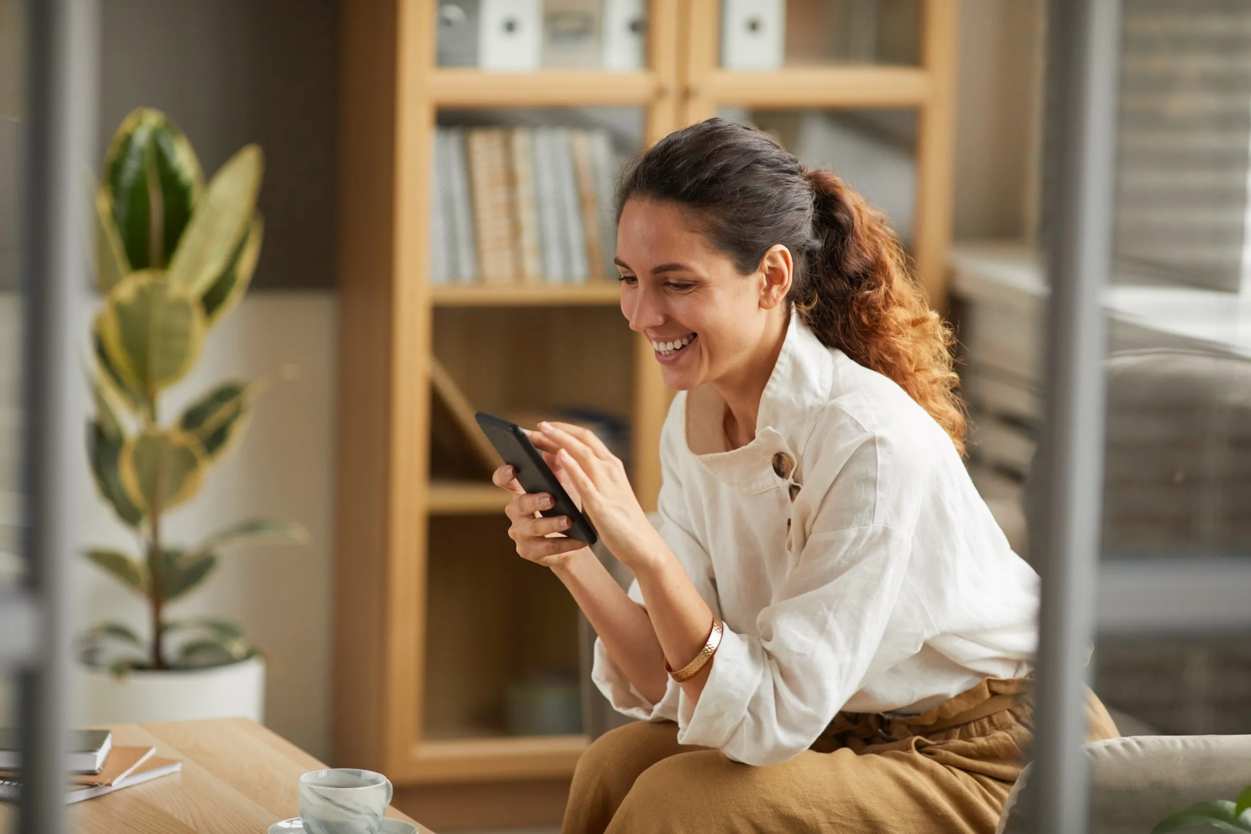 Person on phone at home