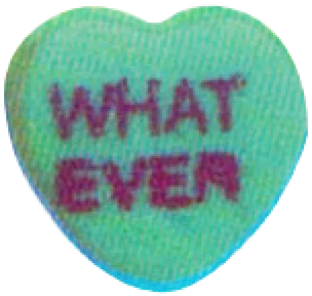 Heart-shaped candy with sarcastic "WHATEVER" text in purple letters