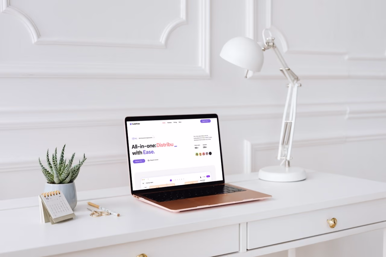 A laptop computer sitting on top of a white desk.