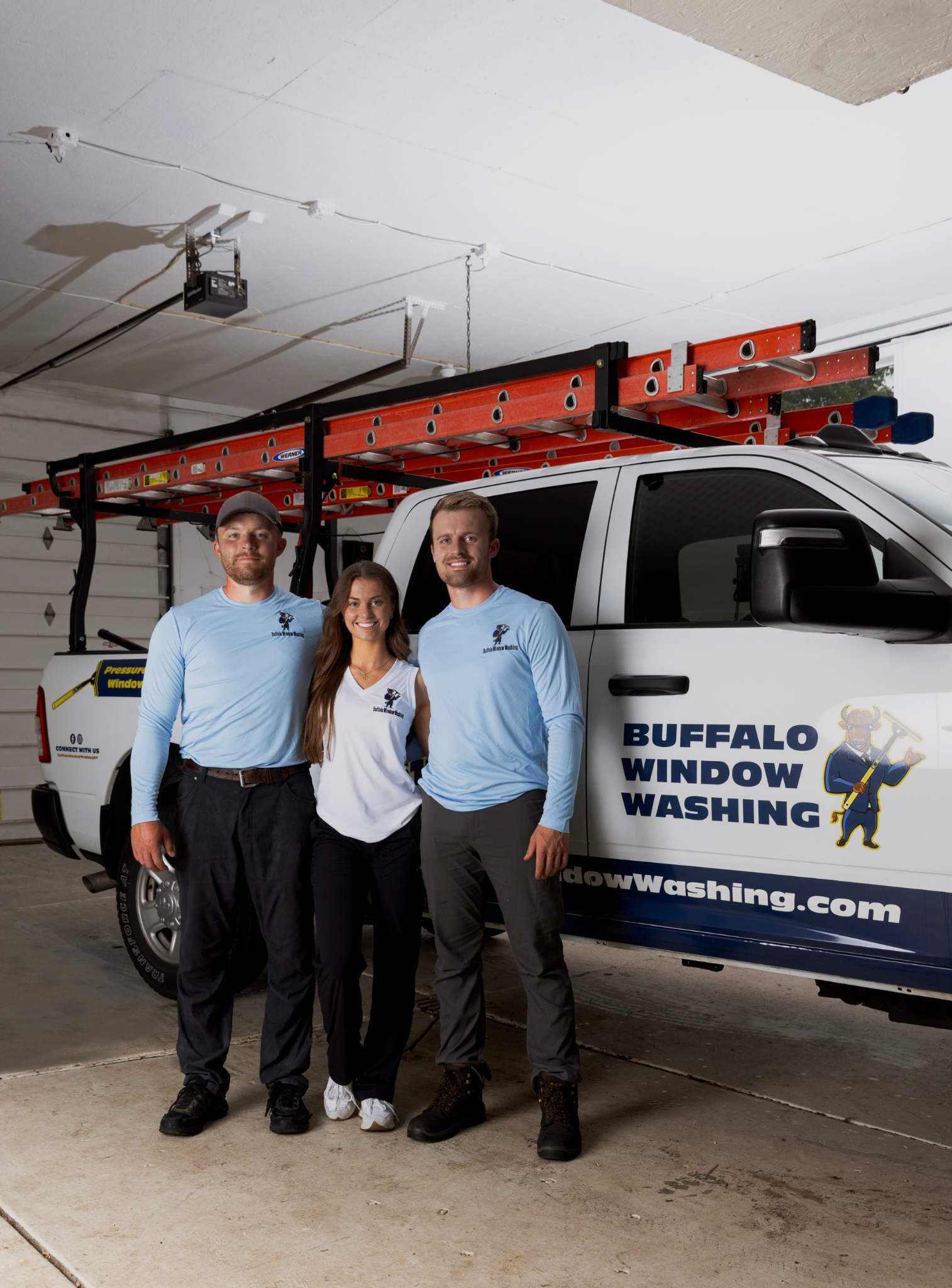 Logan, Lucas, and Ella in front of wrapped truck
