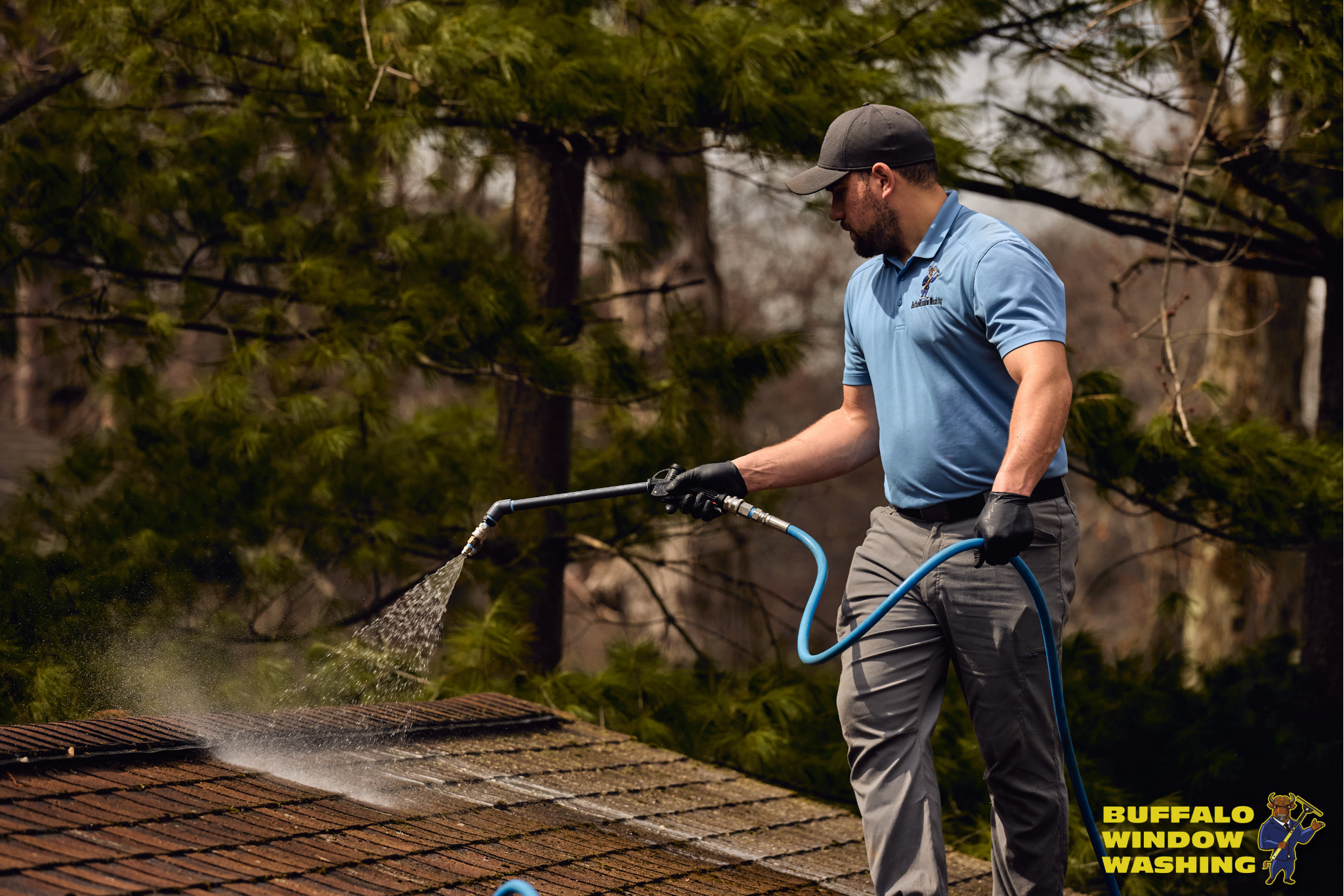 Technician cleaning roof
