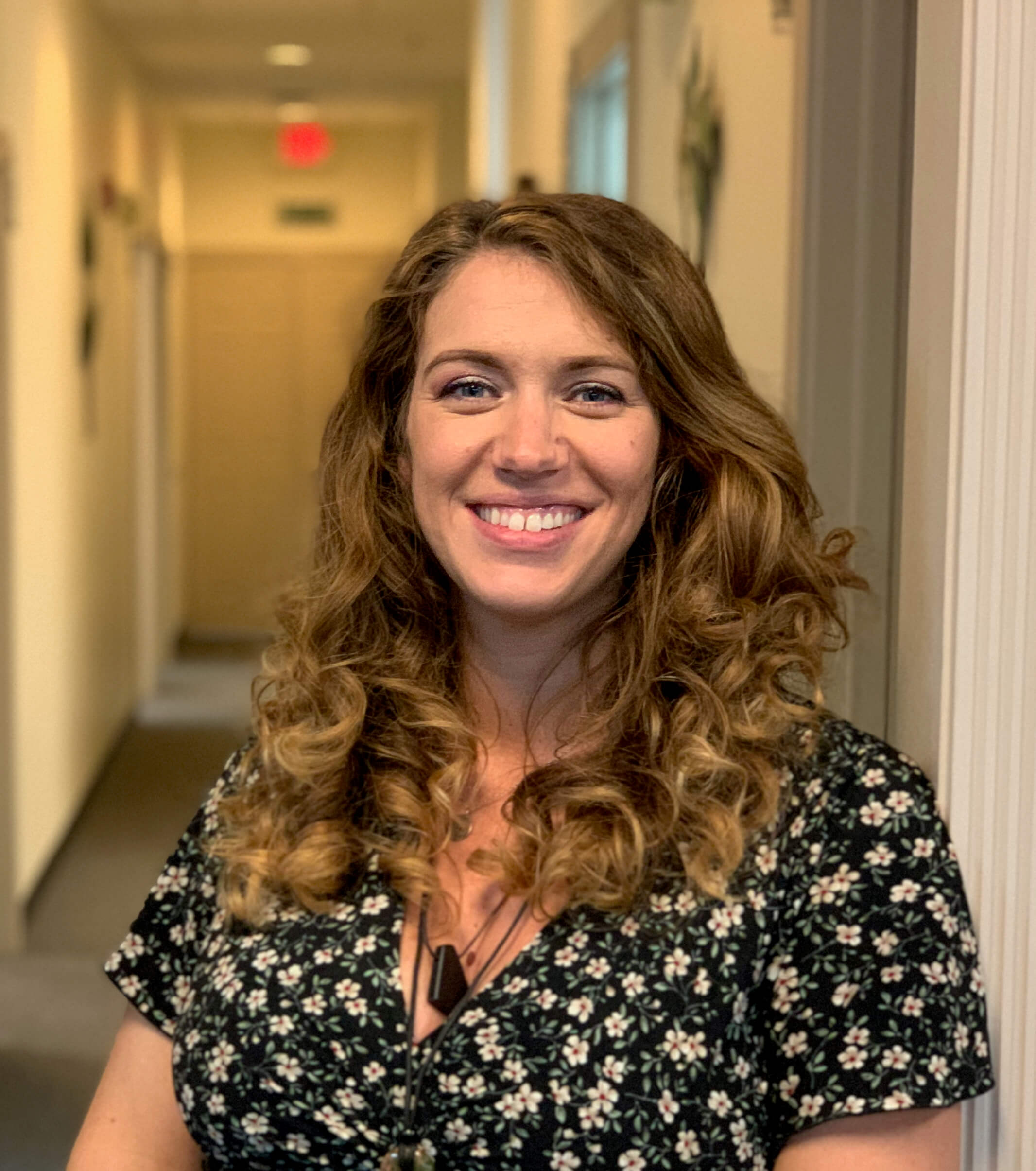 Sara, the Thinworks General Manager, smiling warmly to welcome you into their office.