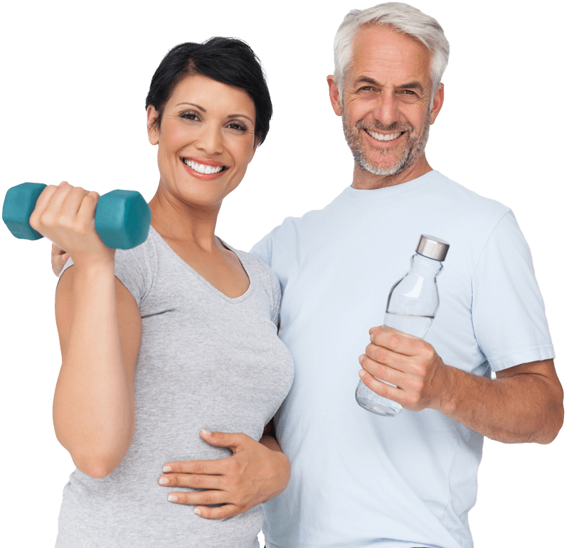 An in-shape, aging couple smiling happily.