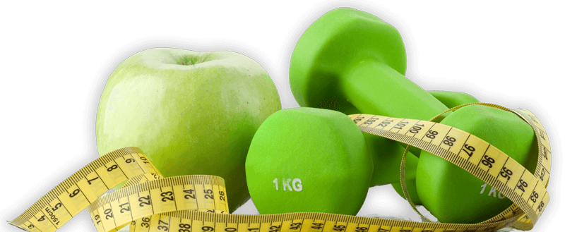 A still shot of an apple, two dumbells, and a tape measure.