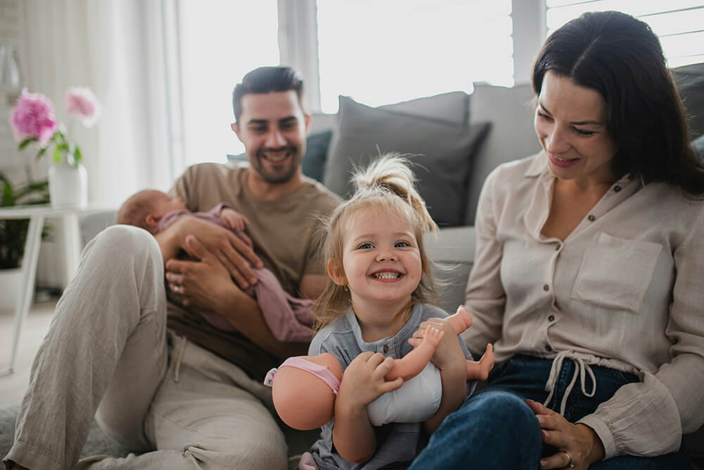OKC Scissortail park and downtown skyline framed in a beautiful purple and gold sunset.