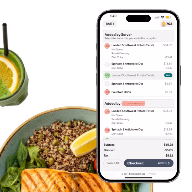 Smartphone screen showing a detailed food order with items, prices, and payment status next to a green drink with lemon and a plate of grilled salmon and quinoa salad.