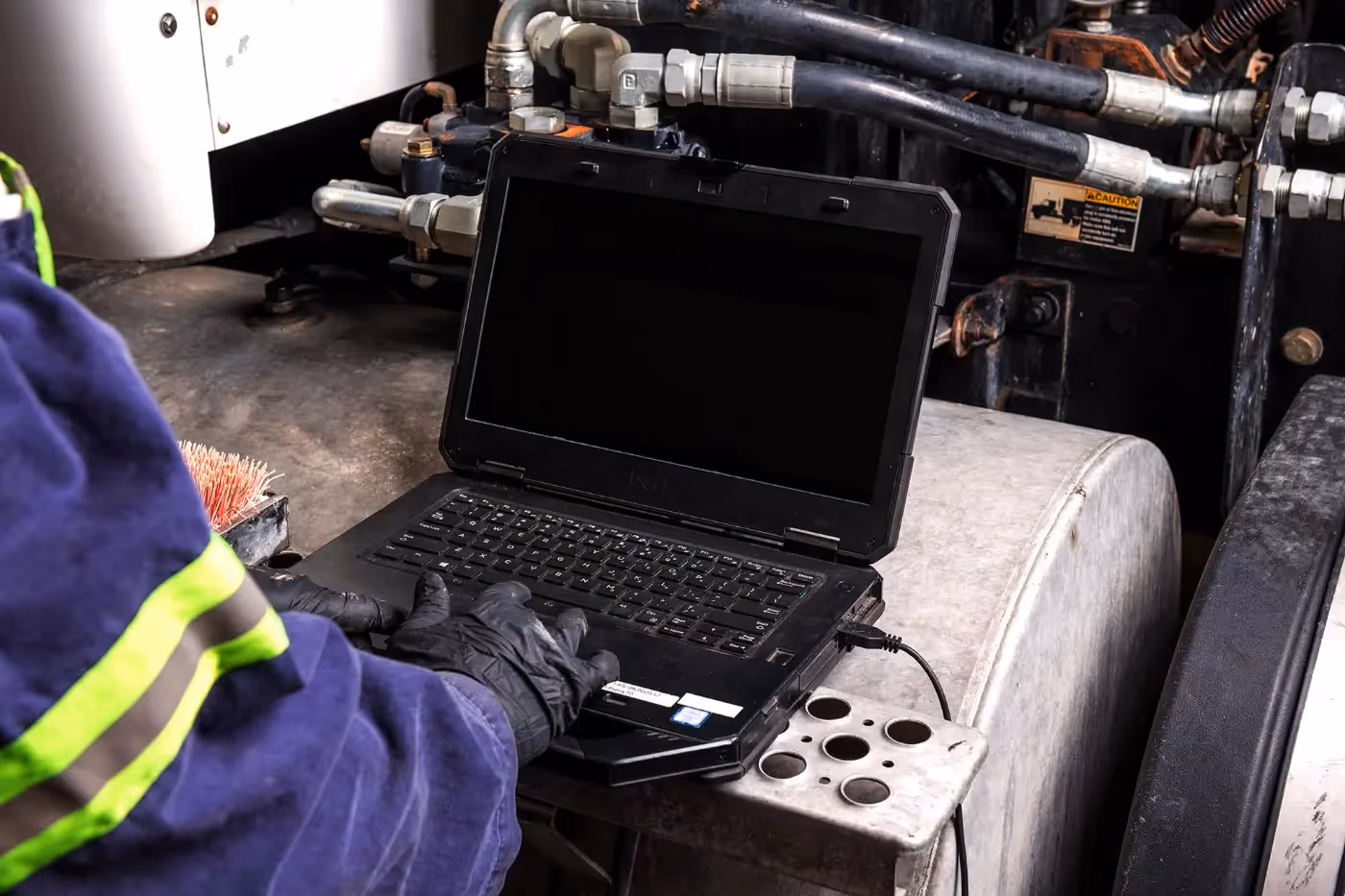 Mobile diesel mechanic performing electrical repairs on commercial truck fleet in Los Angeles, CA