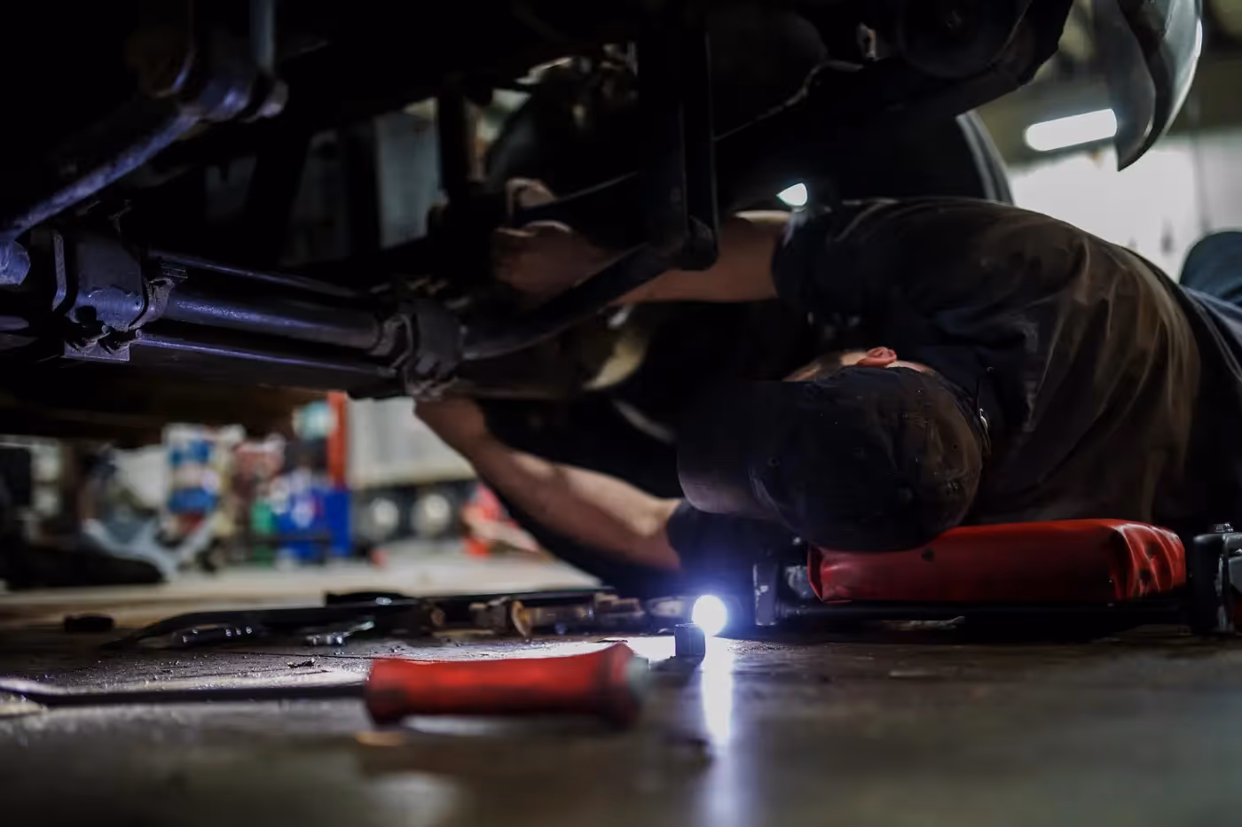 Mobile diesel mechanic performing driveline repairs on semi truck in Riverside, CA