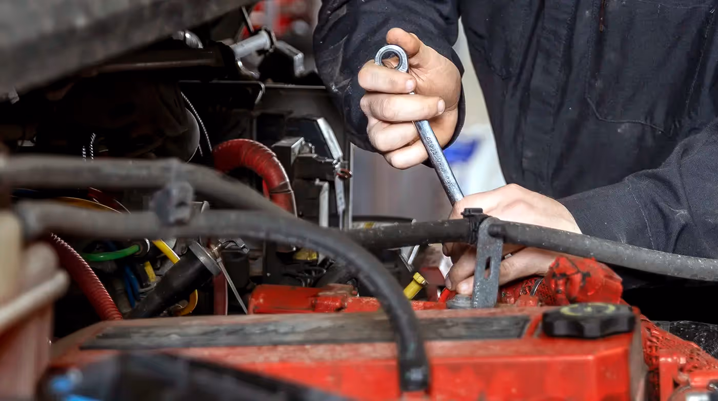 Mobile diesel mechanic performing EGR maintenance on commercial truck in Anaheim, CA