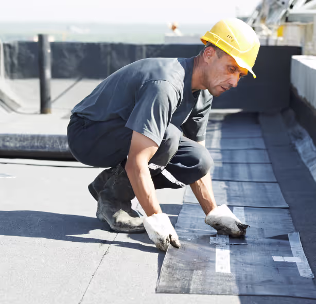 ecoshield exteriors roofing contractor installing new roof underlayment on a denver, co property