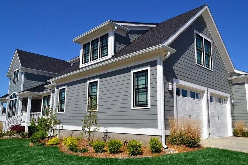 Dark siding installed by ecoshield exteriors on an Aurora, CO home
