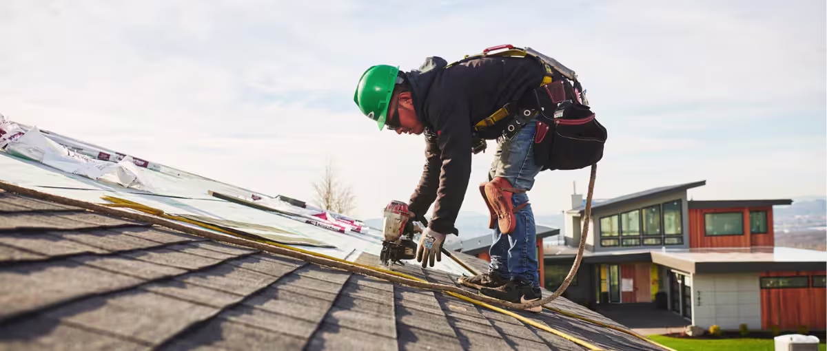 Ecoshield Exteriors roofing contractor installing a new roof on a denver colorado home