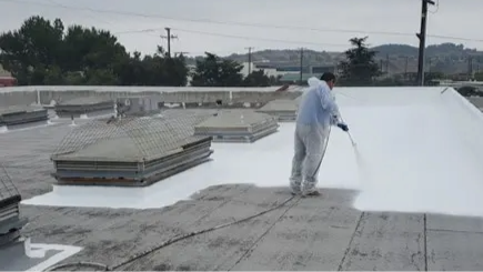 Commercial roof coating companies applying acrylic system in Colorado