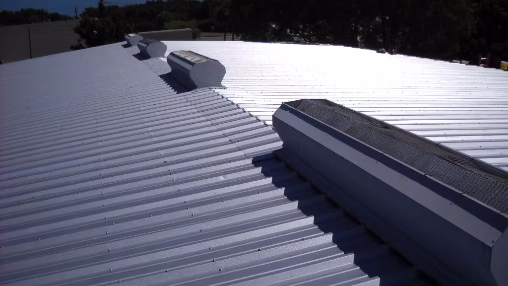 flat building metal roof installed by ecoshield on a denver area business