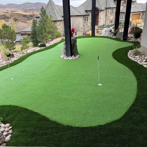 Backyard turf and putting green installation at a Colorado home