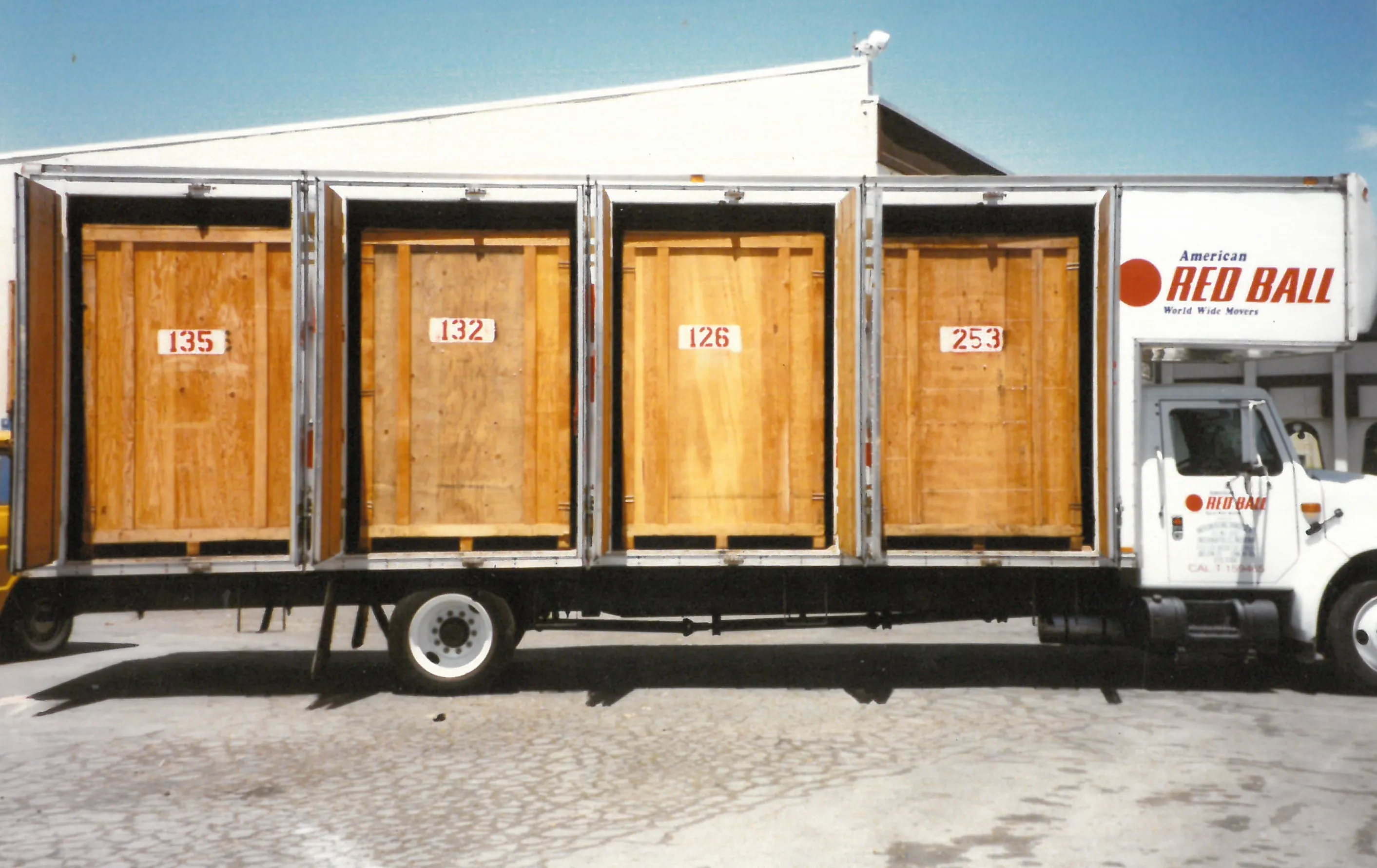 Moving truck with numbered storage vaults