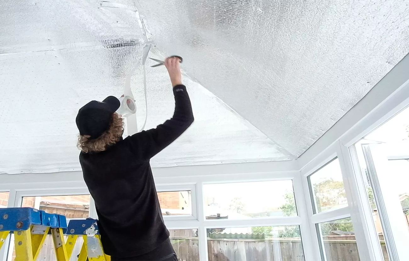 CIS insulating a conservatory roof. 