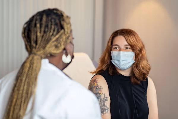 Caption: In this 2022 photo, captured inside a clinical setting, a health care provider consults a patient on influenza (flu) vaccine options. The best way to prevent seasonal flu illness is to get vaccinated every year. CDC recommends everyone 6-months of age and older get a flu vaccine every season. If you have questions about which vaccine is best for you, talk to your doctor or other health care provider . Content Providers(s): CDC/ Robin Spratling Creation Date: 2022 Photo Credit: Brandon Clifton ID#: 26174 https://phil.cdc.gov/Details.aspx?pid=26174