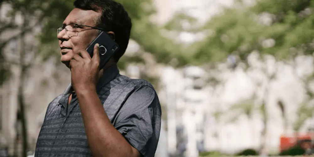Male adult calling car lender for payment options to avoid repossession and is asking to defer a car payment 