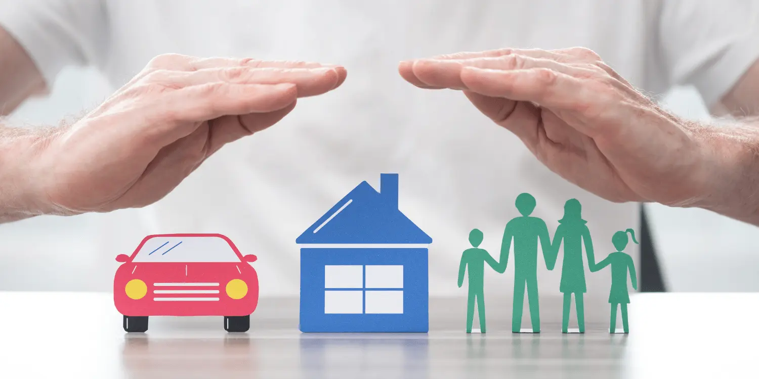 A person holding their hands over images of a house, a car, and a family depicting the coverage the insurance brings to a household.