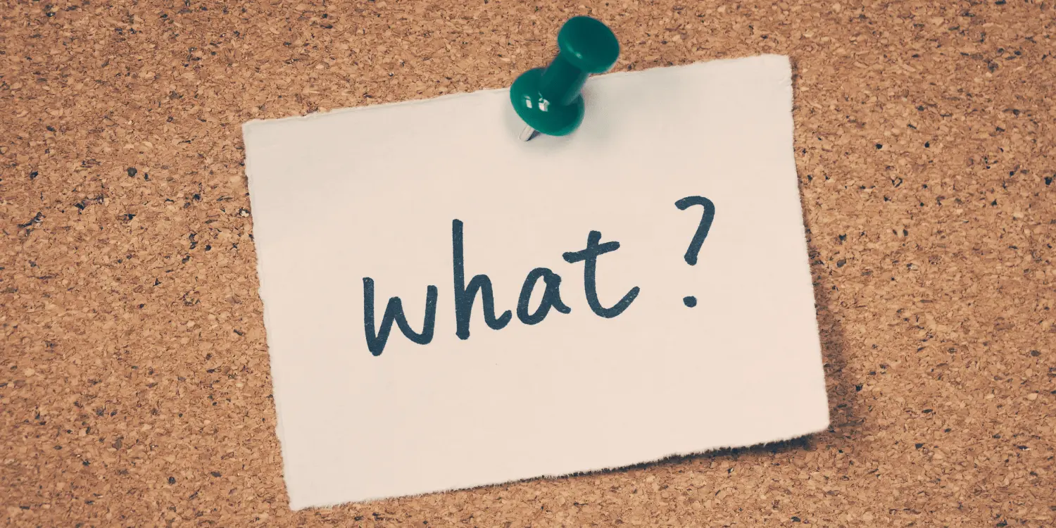 A cork board with the word "what?" written on a post-it pinned to it questioning about HARP.
