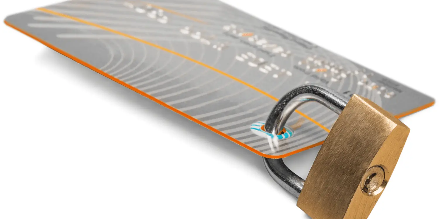 A padlocked credit card, illustrating the concept of a secured credit card for building credit.