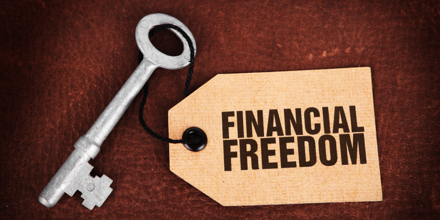 A key labeled 'Financial Freedom' symbolizes how a debt management plan helps consolidate unsecured debts into one monthly payment, reducing interest rates and fees through nonprofit credit counseling agencies.