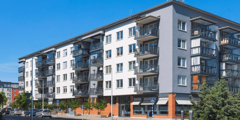 Modern city apartments where renters look for budget-friendly housing in high-cost areas.