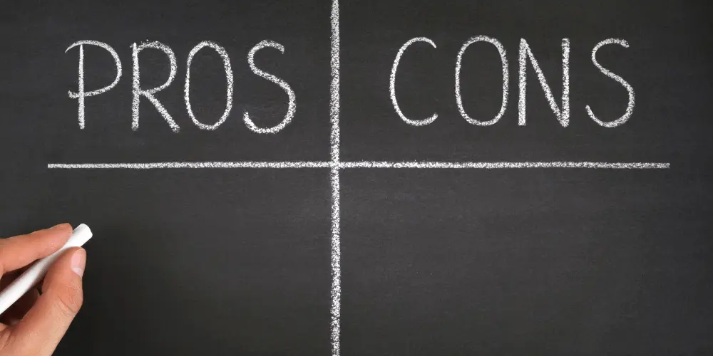 Pros and cons written on blackboard, representing the advantages and drawbacks of co-signing a lease with poor credit.